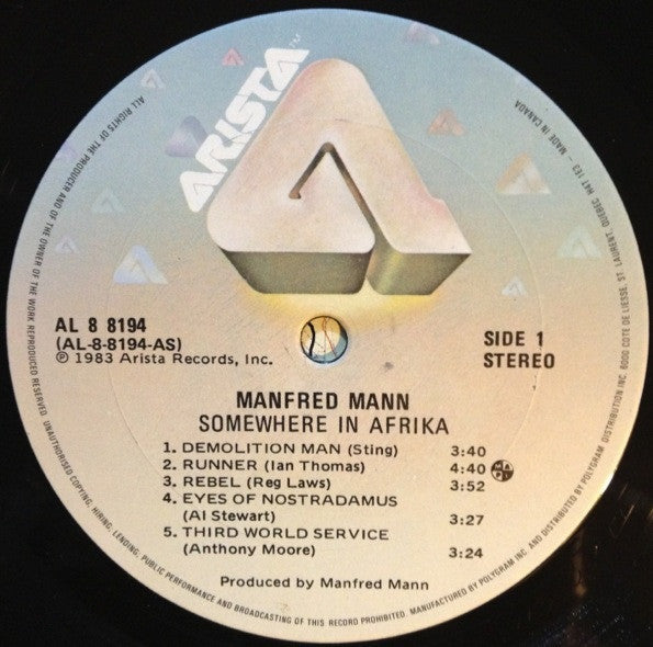 Manfred Mann's Earth Band – Somewhere In Afrika -1983 VinylPursuit.com
