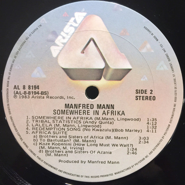 Manfred Mann's Earth Band – Somewhere In Afrika -1983 VinylPursuit.com