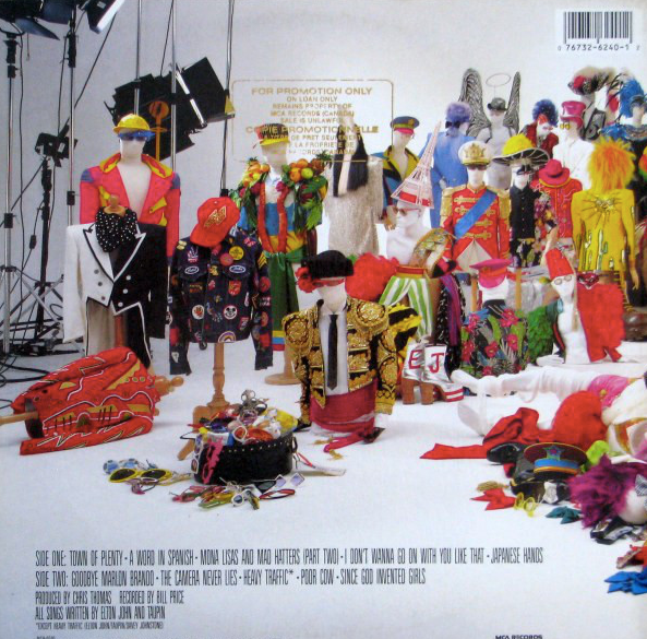 Elton John – Reg Strikes Back - 1988 VinylPursuit.com
