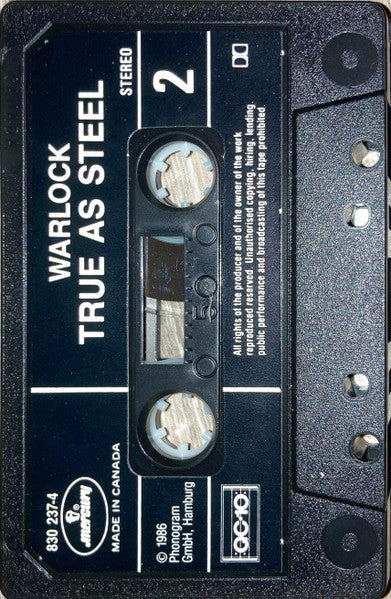 Warlock – True As Steel - 1986 Cassette VinylPursuit.com