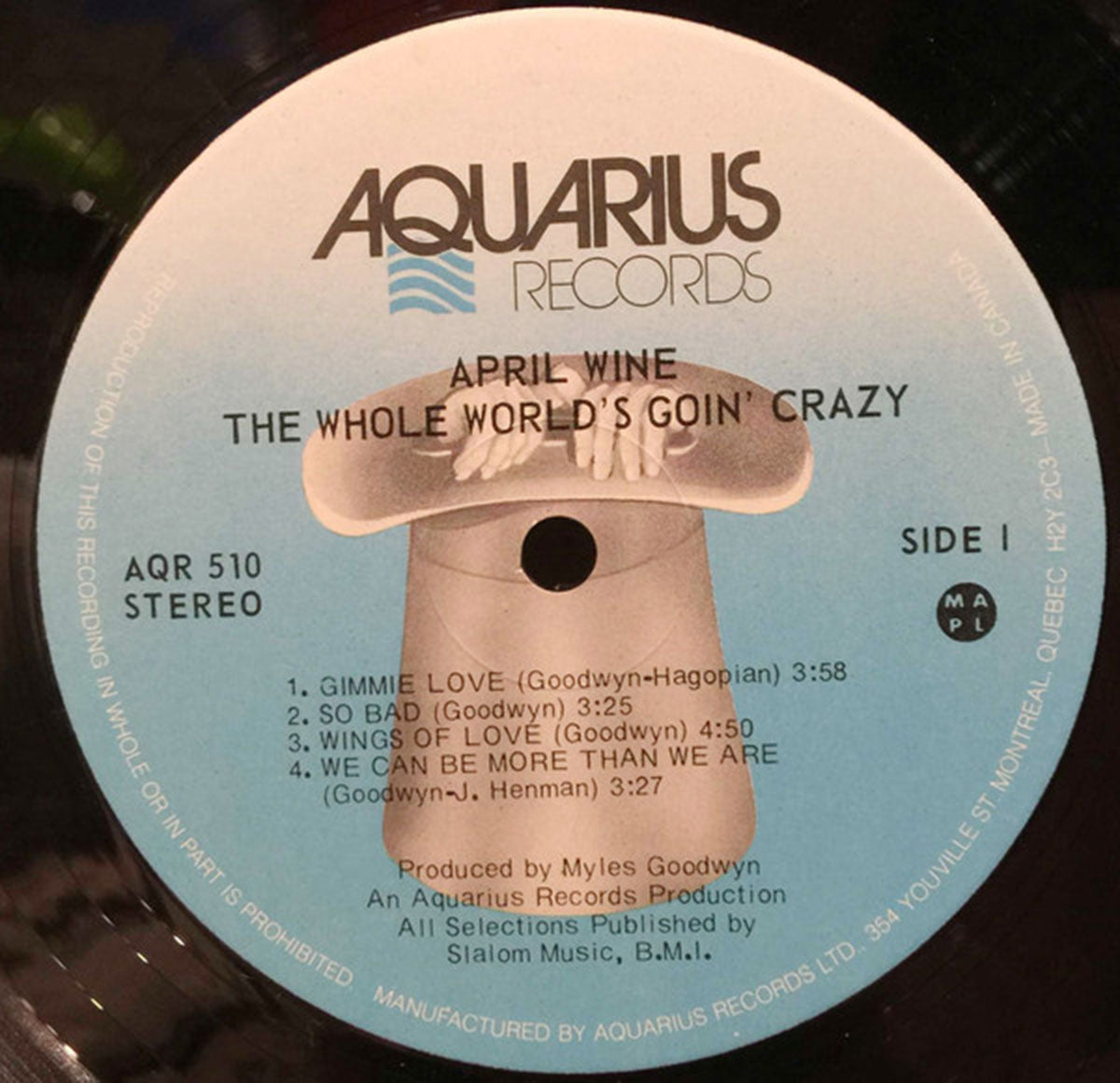 April Wine ‎– The Whole World's Goin' Crazy - 1976 Embossed Cover VinylPursuit.com
